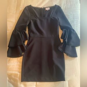 Dress by Devlin; black size 2; short dress with flared long sleeves; square neck